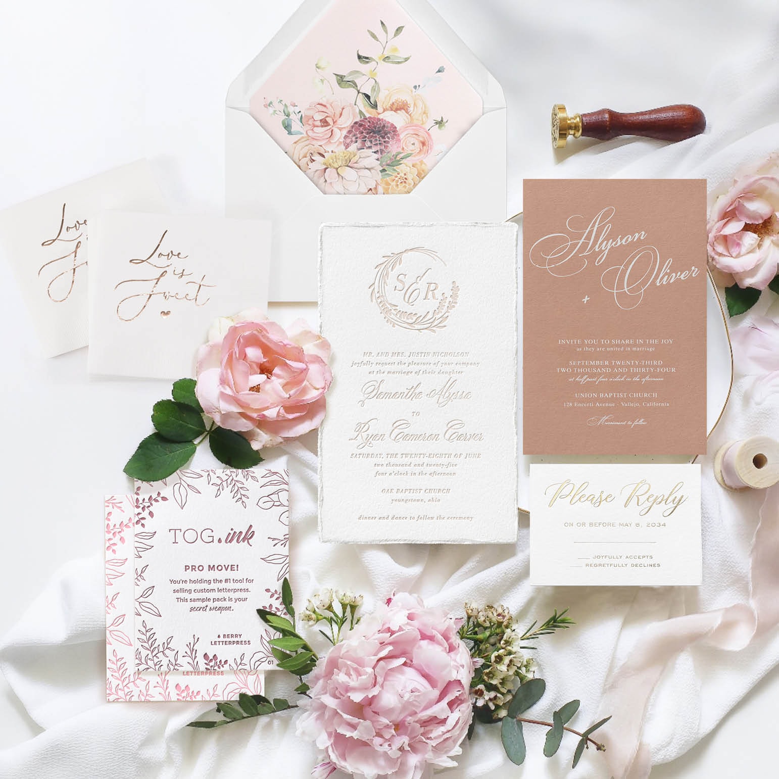 Elegant wedding stationery suite — invitations, save-the-dates, and florals